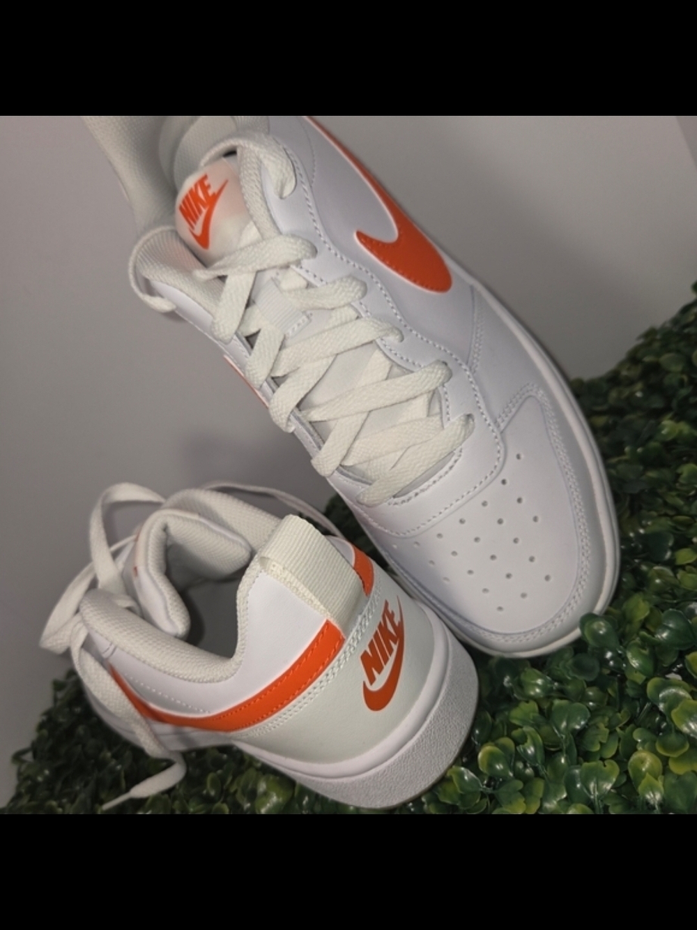 Nike Kids White Sneakers with Bright Orange Swoosh